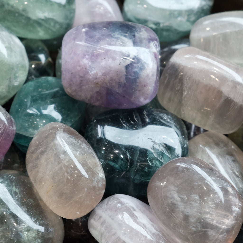Fluorite tumbled stones 20-35 mm, colorful and polished, known for balancing energy, enhancing focus and boosting the immune system.