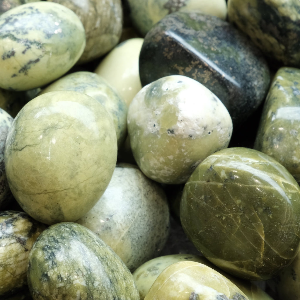 Serpentine tumbled stones for meditation and healing energy, enhance spiritual exploration and aid in detoxification.